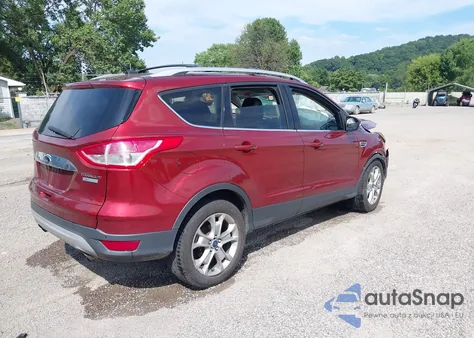 2014 Ford Escape Titanium from USA, damaged, VIN 1FMCU0J90EUD64977